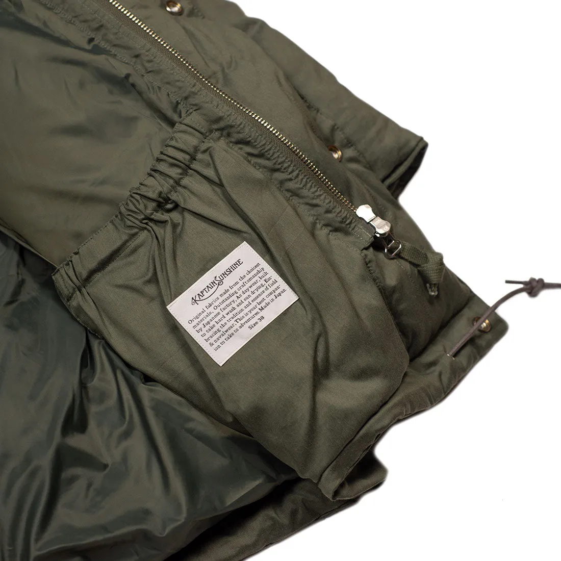 "Expedition Down Parka" in smoky sage green cotton and silk